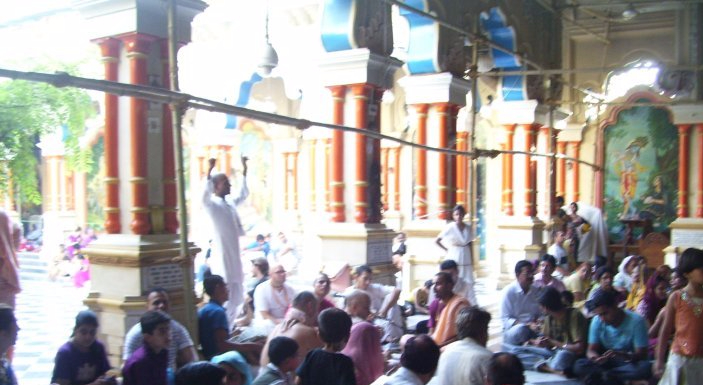 Iskcon temple Vrindawan - group of worshippers chanting Radha Krishna Songs and Bhajans